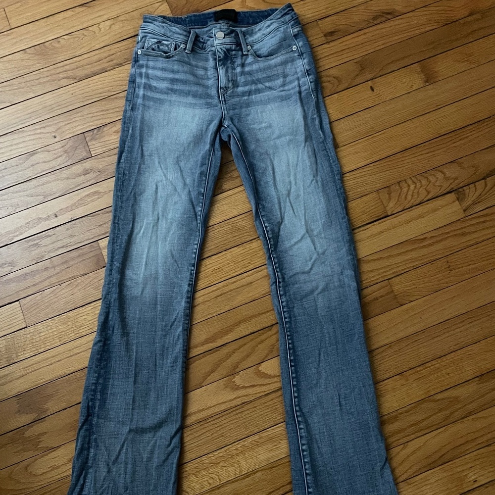 Light wash bootcut buckle jeans